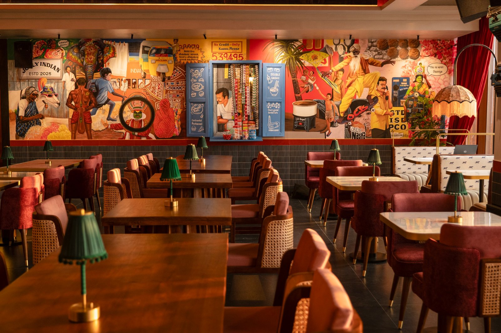 Interior décor at Jolly Indian, Alwarpet — retro pan-Indian art